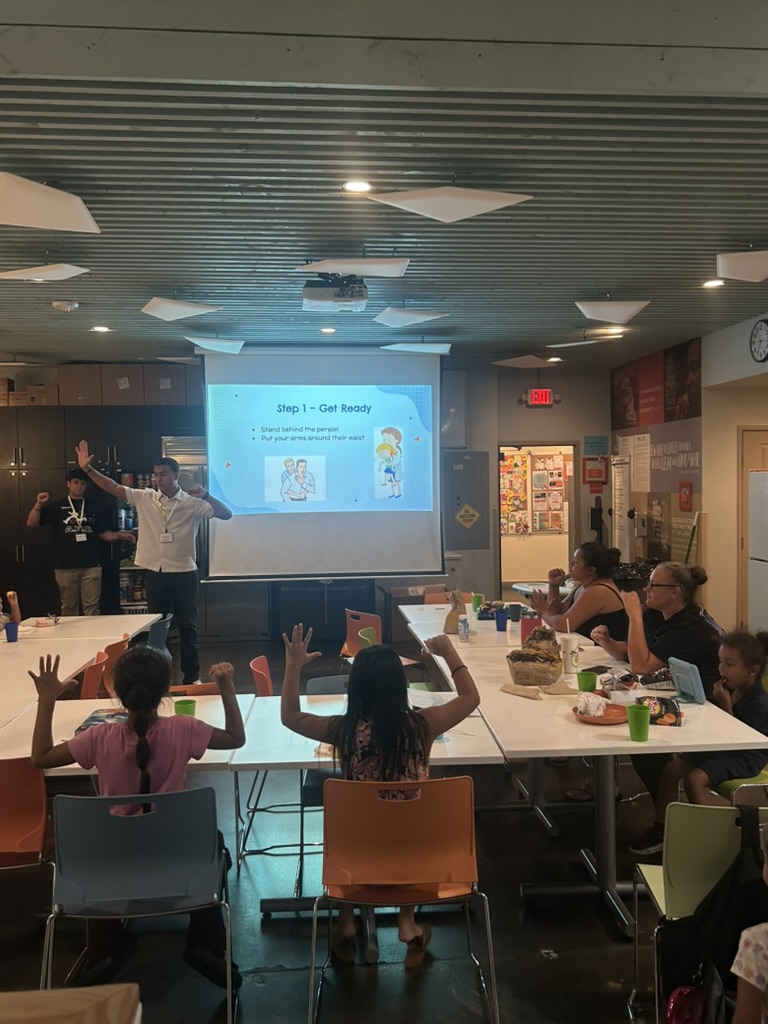 Children participating in the Heimlich maneuver training